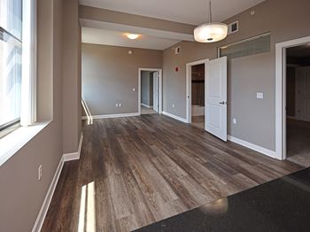 Model Suite with All New LVT Hard Surface Flooring at The Residences at Hanna in Cleveland OH - Living Area